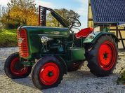 Play Farmer Tractor Puzzle